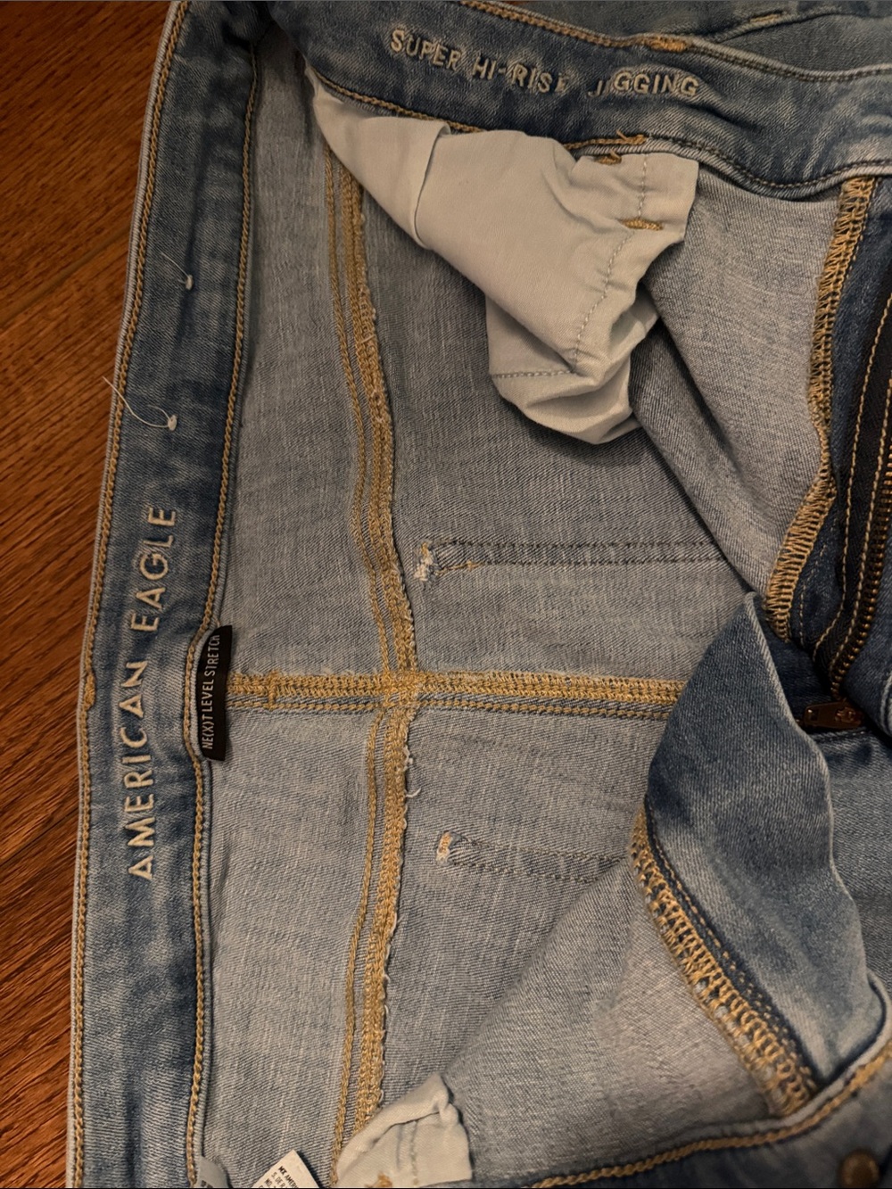 American Eagle Outfitters Light Blue Denim Jeggings with Gold Stitching